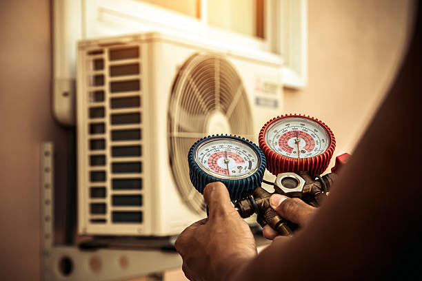 Professional Heat Pump Repair technician working in Harrisburg, OH